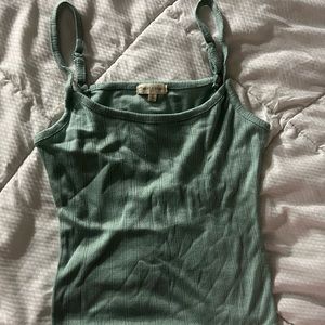 Woman’s small teal crop top